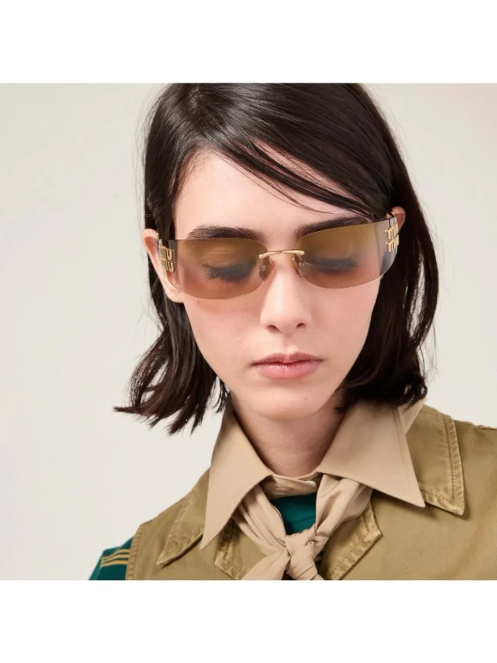 Miu Miu Rectangular Sunglasses in Gold